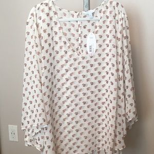 Blouse with caplet style